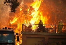 Bushfire near a house